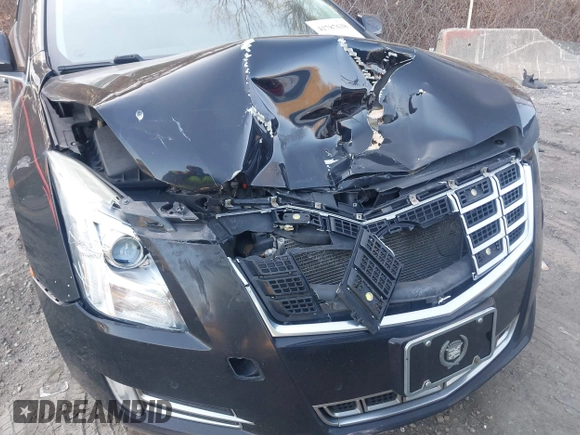 2013 Cadillac XTS Premium z VIN 2G61S5S38D9199459, wystawiony jako IAAI lot #41787638 z przebiegiem 171 298 mil mil oraz . Historia ofert i sprzedaży dostępna na DreamBid. Obrazek 6.