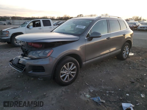 2013 Volkswagen Touareg Lux with VIN WVGEF9BP9DD008935, listed as a Copart auction lot 79859394 with Not Provided miles and Salvage Title. Bid and sale history available at DreamBid. Image 1.