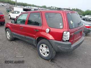 2004 Ford Escape XLT with VIN 1FMYU93154DA14180, listed as a IAAI auction lot 42430706 with 266,213 mi miles and . Bid and sale history available at DreamBid. Image 3.