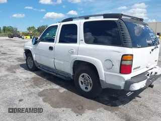 2005 Chevrolet Tahoe Z71 z VIN 1GNEC13T05R219656, wystawiony jako IAAI lot #42802342 z przebiegiem 265 766 mil mil oraz . Historia ofert i sprzedaży dostępna na DreamBid. Obrazek 3.