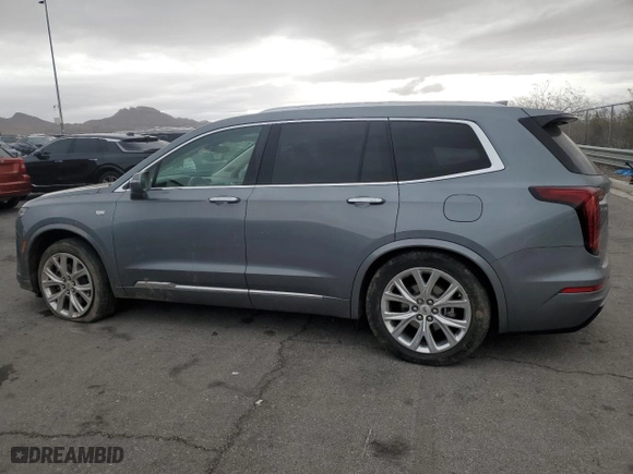 2020 Cadillac XT6 FWD Premium Luxury with VIN 1GYKPCRS5LZ201302, listed as a Copart auction lot 47898165 with 61,527 mi miles and Salvage Title. Bid and sale history available at carsss.com. Image 2.