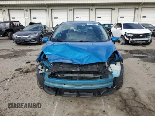 2015 Ford Fiesta Titanium z VIN 3FADP4FJ7FM120958, wystawiony jako Copart lot #85260204 z przebiegiem 144 587 mil mil oraz Szkoda całkowita • Salvage title. Historia ofert i sprzedaży dostępna na DreamBid. Obrazek 5.