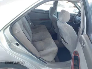 2003 Toyota Camry LE with VIN JTDBE32K730176610, listed as a IAAI auction lot 41627010 with 238,502 mi miles and . Bid and sale history available at DreamBid. Image 8.