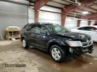 2012 Dodge Journey SXT z VIN 3C4PDCCG4CT188235, wystawiony jako Copart lot #88954495 z przebiegiem 159 825 mil mil oraz Czysty tytuł • Clean title. Historia ofert i sprzedaży dostępna na DreamBid. Obrazek 15.