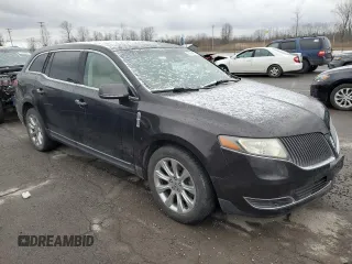 2014 Lincoln MKT with VIN 2LMHJ5FK9EBL50142, listed as a Copart auction lot 85564374 with 180,263 mi miles and Salvage Title. Bid and sale history available at DreamBid. Image 4.