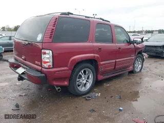2005 GMC Yukon SLT with VIN 1GKEC13T85J178091, listed as a IAAI auction lot 41340788 with 160,587 mi miles. Bid and sale history available at carsss.com. Image 4.