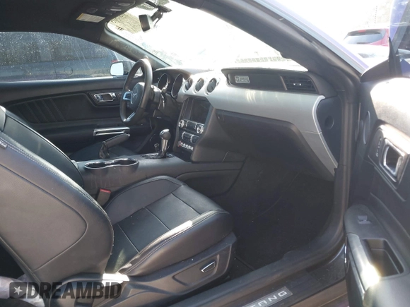 2015 Ford Mustang EcoBoost with VIN 1FA6P8TH5F5358816, listed as a IAAI auction lot 41573005 with 57,975 mi miles and . Bid and sale history available at carsss.com. Image 5.
