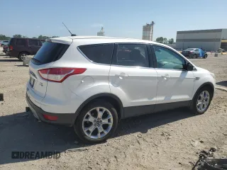 2013 Ford Escape SEL z VIN 1FMCU9H94DUC68911, wystawiony jako Copart lot #61671155 z przebiegiem 165 985 mil mil oraz Szkoda całkowita • Salvage title. Historia ofert i sprzedaży dostępna na DreamBid. Obrazek 3.