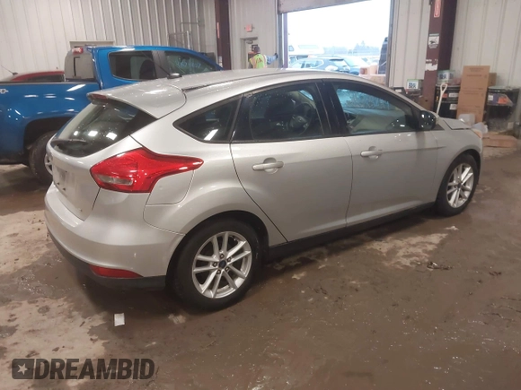 2015 Ford Focus SE with VIN 1FADP3K29FL328611, listed as a IAAI auction lot 41669844 with 136,666 mi miles. Bid and sale history available at carsss.com. Image 4.