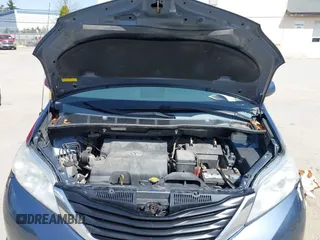 2014 Toyota Sienna LE AAS with VIN 5TDKK3DC1ES436031, listed as a IAAI auction lot 42147191 with 276,821 mi miles. Bid and sale history available at carsss.com. Image 10.