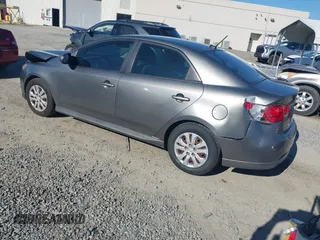 2012 Kia Forte EX with VIN KNAFU4A24C5560114, listed as a IAAI auction lot 41669309 with 236,464 mi miles. Bid and sale history available at carsss.com. Image 3.