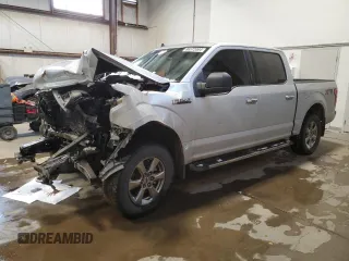 2019 Ford F-150 XL with VIN 1FTEW1EB4KKE25698, listed as a Copart auction lot 86572094 with 211,190 mi miles and Salvage Title. Bid and sale history available at carsss.com. Image 1.