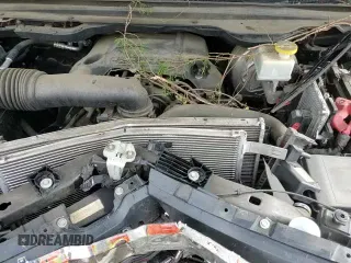 2019 Ram 1500 Big Horn with VIN 1C6RREBT4KN700988, listed as a Copart auction lot 68013335 with 130,013 mi miles and Salvage title. Bid and sale history available at DreamBid. Image 16.