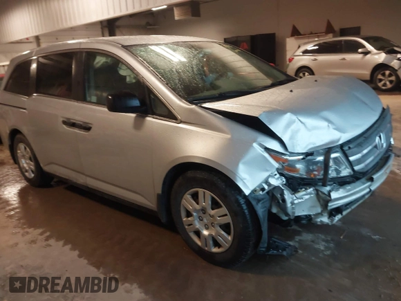 2012 Honda Odyssey LX with VIN 5FNRL5H27CB092988, listed as a IAAI auction lot 41933507 with 123,233 mi miles and . Bid and sale history available at DreamBid. Image 1.