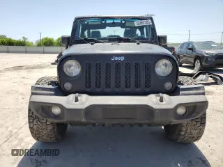 2015 Jeep Wrangler Sport with VIN 1C4GJWAG8FL563198, listed as a Copart auction lot 52867385 with 47,854 mi miles and Salvage title. Bid and sale history available at DreamBid. Image 5.