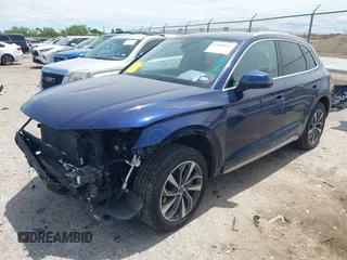 2021 Audi Q5 Premium with VIN WA1AAAFY7M2004975, listed as a IAAI auction lot 42190283 with 56,810 mi miles and . Bid and sale history available at DreamBid. Image 18.
