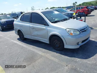2003 Toyota ECHO with VIN JTDBT123935047533, listed as a IAAI auction lot 42143695 with 170,911 mi miles. Bid and sale history available at carsss.com. Image 1.
