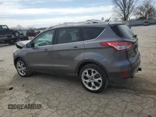 2013 Ford Escape Titanium z VIN 1FMCU9J90DUA72264, wystawiony jako Copart lot #49906445 z przebiegiem 126 527 mil mil oraz Szkoda całkowita • Salvage title. Historia ofert i sprzedaży dostępna na DreamBid. Obrazek 2.