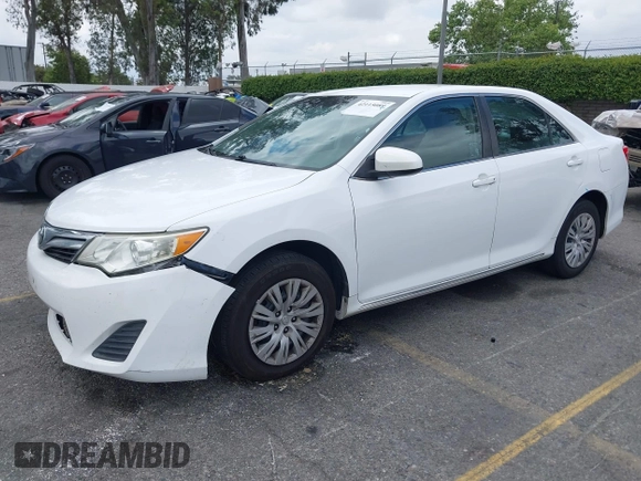 2014 Toyota Camry L with VIN 4T1BF1FK4EU403013, listed as a IAAI auction lot 42115089 with 221,686 mi miles and . Bid and sale history available at DreamBid. Image 2.