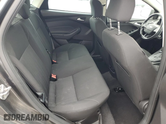 2016 Ford Focus SE z VIN 1FADP3F23GL405565, wystawiony jako Copart lot #60173935 z przebiegiem 82 167 mil mil oraz Szkoda całkowita • Salvage title. Historia ofert i sprzedaży dostępna na DreamBid. Obrazek 10.