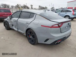 2018 Kia Stinger GT2 with VIN KNAE55LC6J6015897, listed as a IAAI auction lot 41334513 with 126,349 mi miles. Bid and sale history available at carsss.com. Image 3.
