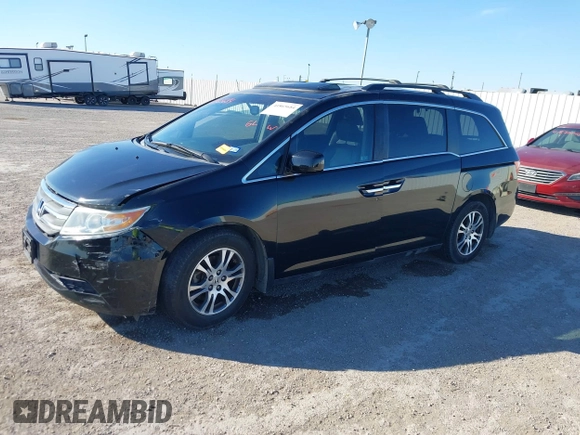 2012 Honda Odyssey EX-L с VIN 5FNRL5H62CB090732, выставлен на аукционе IAAI как лот 41865684 с пробегом 175 361 миль миль и . История ставок и продаж доступна на DreamBid. Изображение 14.