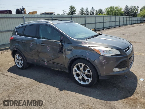 2015 Ford Escape Titanium z VIN 1FMCU9J97FUA38731, wystawiony jako Copart lot #60621085 z przebiegiem 119 704 mil mil oraz Szkoda całkowita • Salvage title. Historia ofert i sprzedaży dostępna na DreamBid. Obrazek 4.