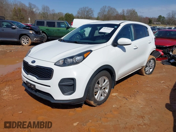 2019 Kia Sportage LX with VIN KNDPM3AC3K7536691, listed as a IAAI auction lot 41733413 with 77,095 mi miles. Bid and sale history available at carsss.com. Image 2.