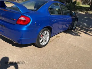 2004 Dodge Neon SRT-4 with VIN 1B3ES66S14D581763, listed as a Copart auction lot 76980654 with 76,376 mi miles and Clean Title. Bid and sale history available at carsss.com. Image 4.