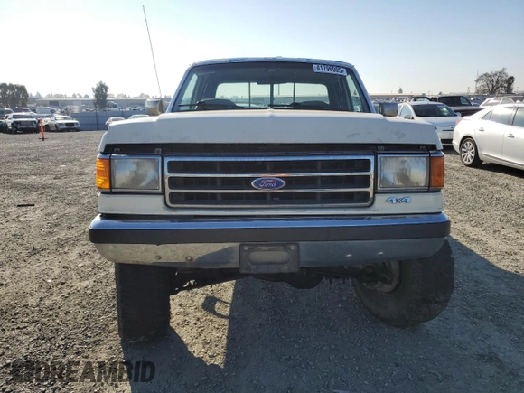 1991 Ford F-250 with VIN 1FTHX26M1MKA14231, listed as a Copart auction lot 41796005 with 6,983 mi miles and Salvage title. Bid and sale history available at DreamBid. Image 5.