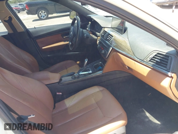 2014 BMW 3 Series 328i with VIN WBA3A5C54EP600398, listed as a IAAI auction lot 42665302 with 117,012 mi miles and . Bid and sale history available at DreamBid. Image 5.