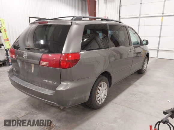 2005 Toyota Sienna CE with VIN 5TDZA23C15S290369, listed as a IAAI auction lot 42143101 with 248,825 mi miles. Bid and sale history available at carsss.com. Image 4.