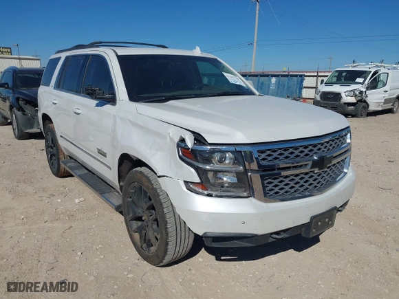 2018 Chevrolet Tahoe LT with VIN 1GNSCBKC8JR128476, listed as a IAAI auction lot 41447799 with 105,209 mi miles. Bid and sale history available at carsss.com. Image 1.