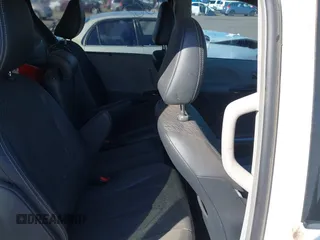 2014 Toyota Sienna SE with VIN 5TDXK3DCXES427950, listed as a IAAI auction lot 40394109 with 149,419 mi miles. Bid and sale history available at carsss.com. Image 8.
