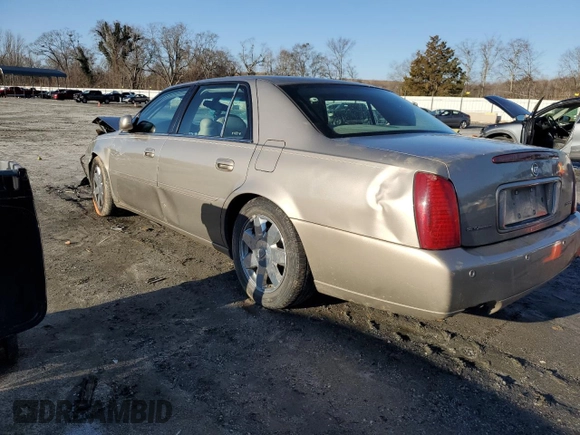 2003 Cadillac DeVille DTS z VIN 1G6KF57963U125853, wystawiony jako Copart lot #42559975 z przebiegiem Nie podano mil oraz Szkody całkowita. Historia ofert i sprzedaży dostępna na DreamBid. Obrazek 2.
