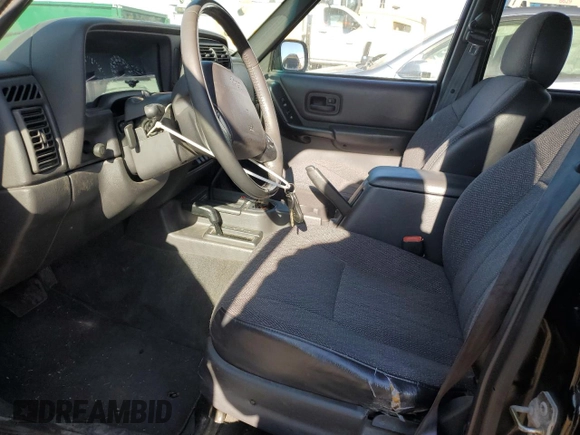 2001 Jeep Cherokee Sport with VIN 1J4FF58S71L540211, listed as a Copart auction lot 87089444 with 190,711 mi miles and Clean title. Bid and sale history available at DreamBid. Image 7.