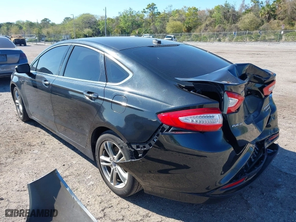2015 Ford Fusion Titanium Hybrid with VIN 3FA6P0RUXFR119698, listed as a IAAI auction lot 41791411 with 140,646 mi miles. Bid and sale history available at carsss.com. Image 3.