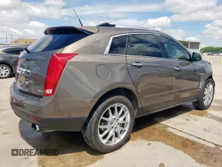 2014 Cadillac SRX Premium Collection with VIN 3GYFNDE33ES567108, listed as a Copart auction lot 55970265 with 97,720 mi miles and Salvage title. Bid and sale history available at DreamBid. Image 3.