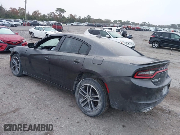 2019 Dodge Charger SXT with VIN 2C3CDXJG1KH730489, listed as a IAAI auction lot 41189171 with 39,514 mi miles and . Bid and sale history available at DreamBid. Image 3.