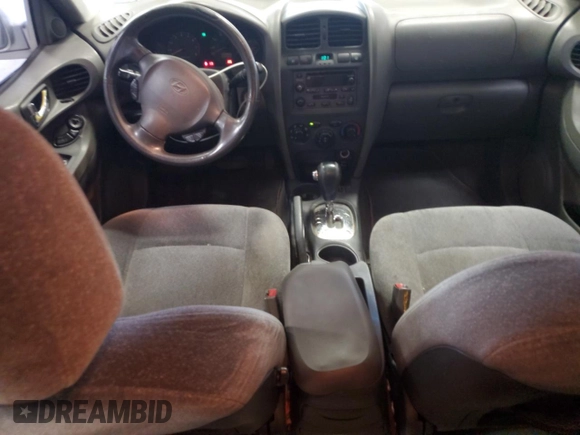 2003 Hyundai Santa Fe GLS z VIN KM8SC13DX3U431975, wystawiony jako Copart lot #56180275 z przebiegiem 239 295 mil mil oraz Czysty tytuł • Clean title. Historia ofert i sprzedaży dostępna na DreamBid. Obrazek 8.