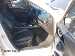 2014 Mazda 3 i Grand Touring with VIN JM1BM1M7XE1102093, listed as a IAAI auction lot 41344433 with 148,395 mi miles and . Bid and sale history available at DreamBid. Image 5.