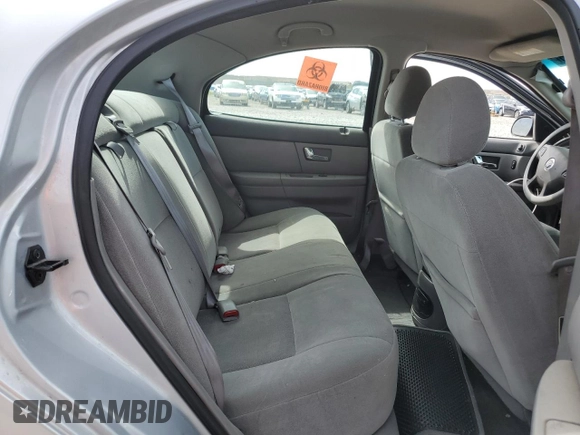 2003 Mercury Sable GS с VIN 1MEFM50273G615376, выставлен на аукционе Copart как лот 57612175 с пробегом 96 754 миль миль и Списание • Salvage title. История ставок и продаж доступна на DreamBid. Изображение 10.