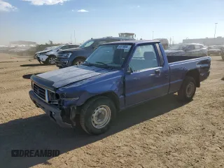 1994 Mitsubishi Mighty Max z VIN JA7LS21G4RP009588, wystawiony jako Copart lot #60519834 z przebiegiem 123 918 mil mil oraz Szkody całkowita. Historia ofert i sprzedaży dostępna na DreamBid. Obrazek 1.