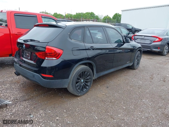 2013 BMW X1 28i with VIN WBAVM1C5XDVW46529, listed as a IAAI auction lot 41975148 with 156,968 mi miles. Bid and sale history available at carsss.com. Image 4.