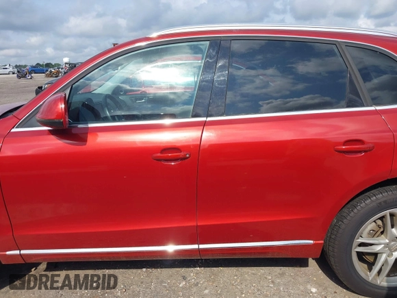 2014 Audi Q5 Premium Plus with VIN WA1CMAFP7EA055438, listed as a IAAI auction lot 41983167 with 157,166 mi miles and . Bid and sale history available at DreamBid. Image 14.