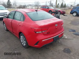 2021 Kia Rio LX with VIN 3KPA24AD2ME370063, listed as a IAAI auction lot 41696461 with 63,628 mi miles. Bid and sale history available at carsss.com. Image 3.