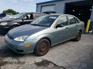 2005 Ford Focus S with VIN 1FAFP34N85W216850, listed as a Copart auction lot 63276365 with 128,370 mi miles and Salvage title. Bid and sale history available at DreamBid. Image 1.