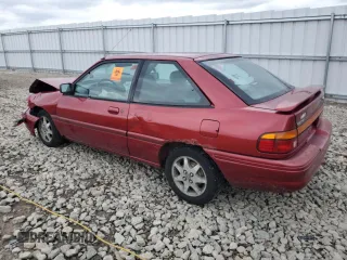 1996 Ford Escort z VIN 3FASP11J6TR151727, wystawiony jako Copart lot #55487725 z przebiegiem 118 276 mil mil oraz Nie do naprawy. Historia ofert i sprzedaży dostępna na DreamBid. Obrazek 2.