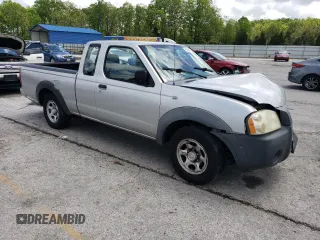 2004 Nissan Frontier XE with VIN 1N6DD26T34C454425, listed as a Copart auction lot 52404115 with 317,899 mi miles and Salvage title. Bid and sale history available at DreamBid. Image 4.