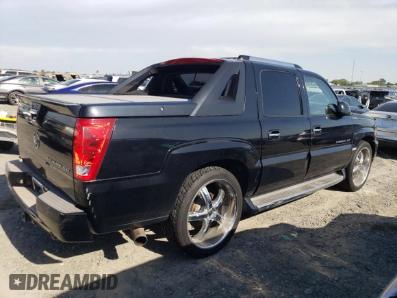 2003 Cadillac Escalade EXT z VIN 3GYEK63N03G339488, wystawiony jako Copart lot #54622395 z przebiegiem 234 427 mil mil oraz Tytuł czysty. Historia ofert i sprzedaży dostępna na DreamBid. Obrazek 3.